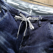 Load image into Gallery viewer, Distressed Ripped Skinny Tapered Jeans w/ Drawstring
